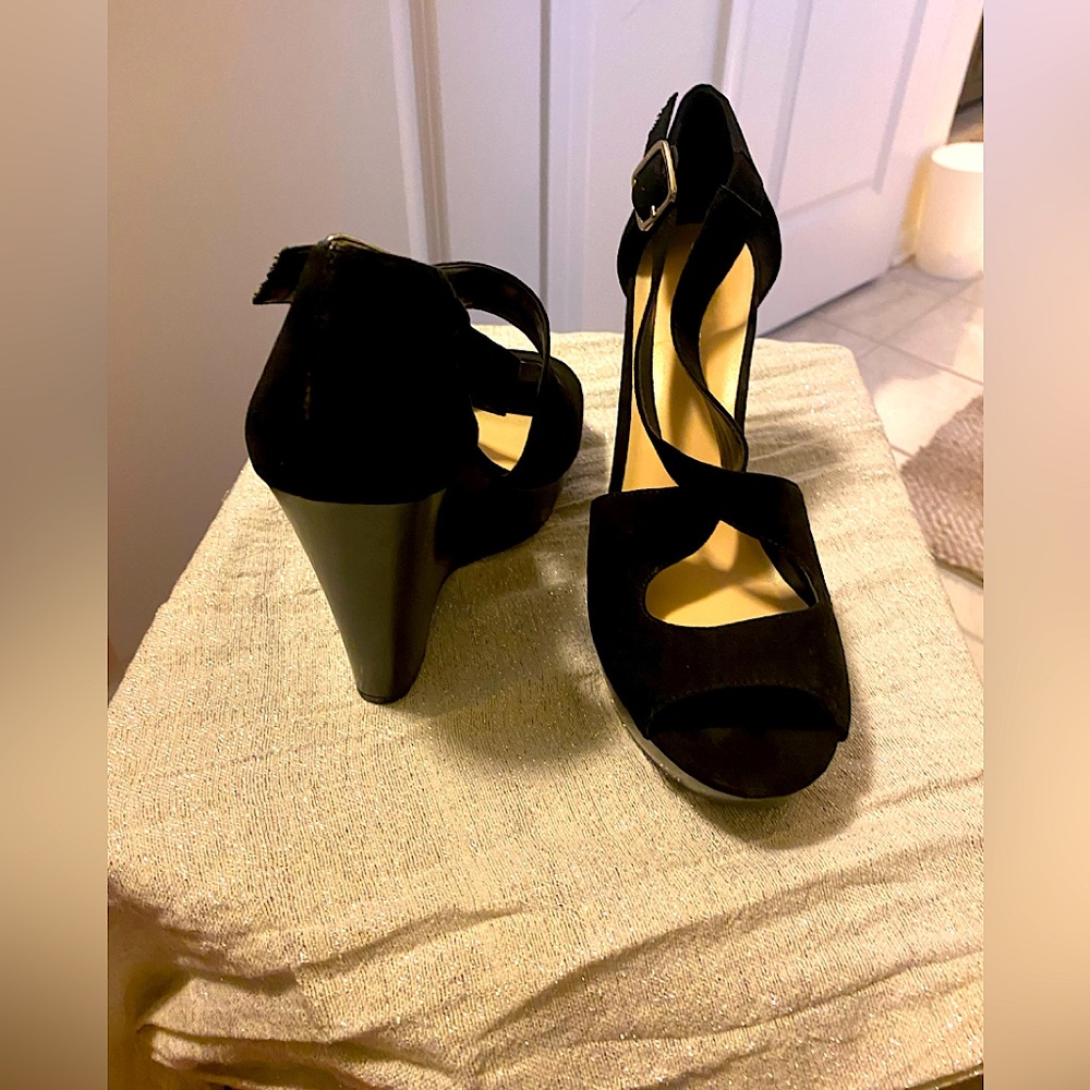 Black Suede criss cross buckle wedge.